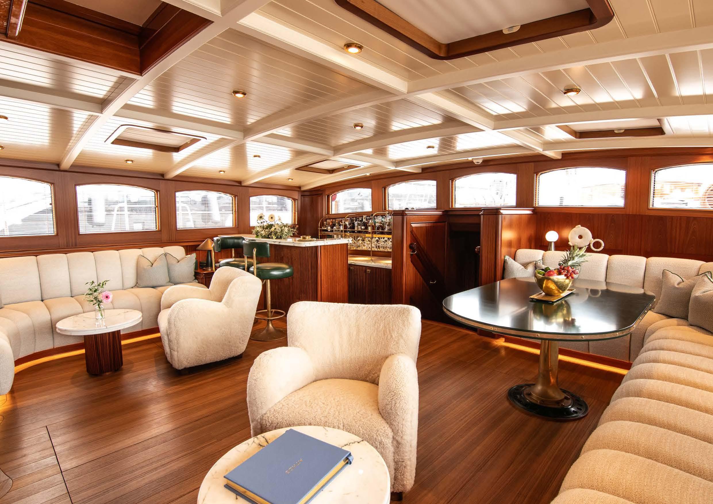 ATHOS_09_Main-salon-dining-room_Athos_-_For_Charter_2024_Page_06_Image_0001-HY6gT3uv